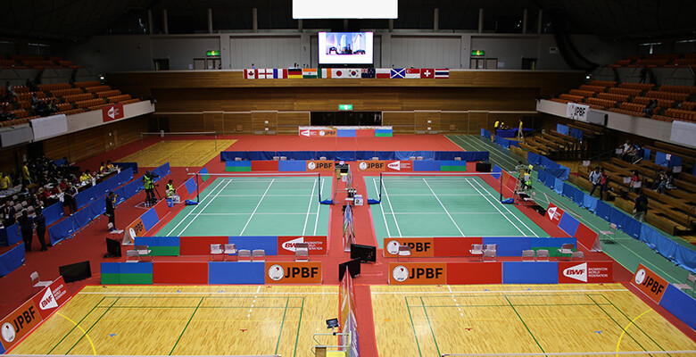 Image: Standing Badminton courts with green flooring; Wheelchair Badminton courts with wooden flooring.