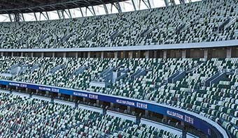 Image: We installed Wi-Fi access points beside handrails, in spaces under seats, and under eaves of the 60,000-seat stadium