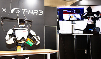 T-H3R being operated in the exhibition hall using a remote control system