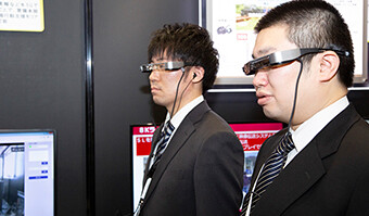 Security guards wearing smart glasses