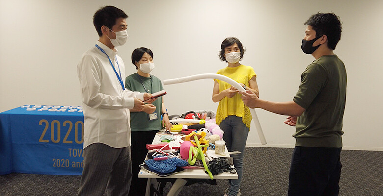 Image: The group exchanged ideas while getting hands-on with objects like hairbrushes and urethane rods.