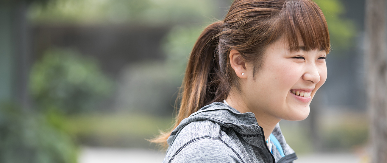 Image: Ms. SATOMI smiling during the interview