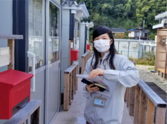 写真：個別訪問の様子